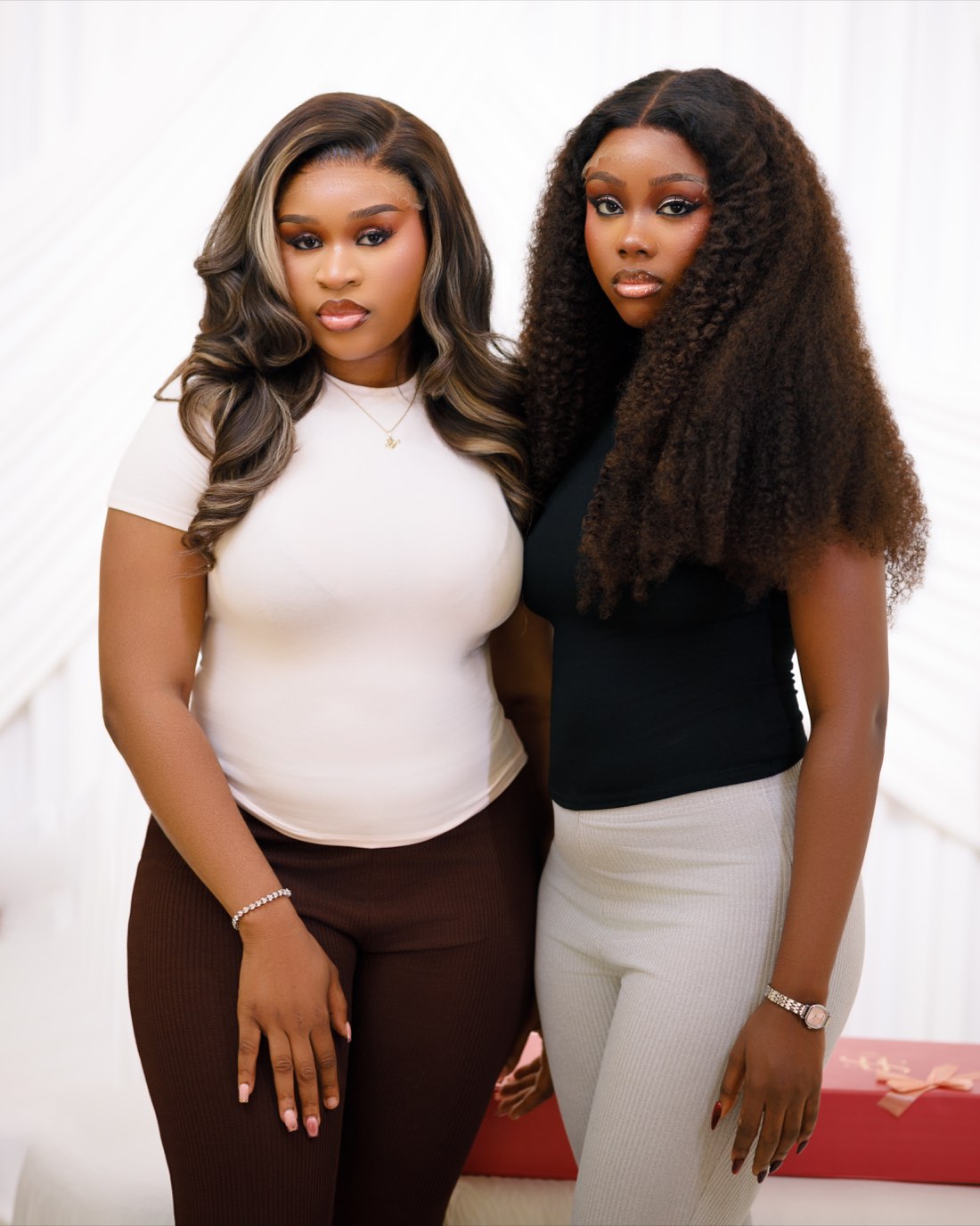 Clients wearing StrandsBySise luxury human hair wigs